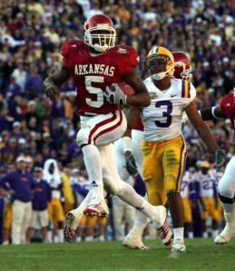 Arkansas Democrat-Gazette/RICK MCFARLAND--1123//07-- Arkansas Darren McFadden runs from LSU defenders at Tiger Stadium in Baton Rouge Friday, Nov. 23, 2007.